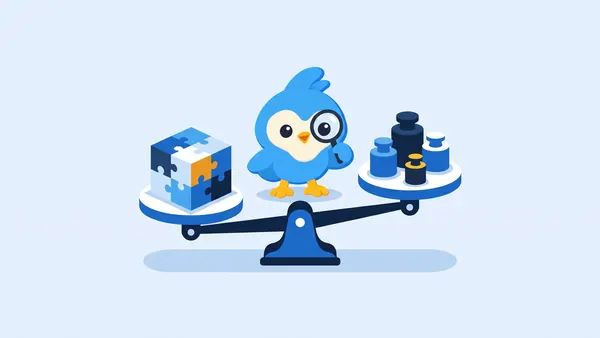 Pip, the blue bird mascot, weighing a puzzle-piece box on a balance scale against weights